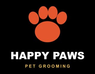 An orange paw print above the words Happy Paws Pet Grooming