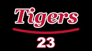 The word Tigers in red script with a white outline, a swoosh and the number 23